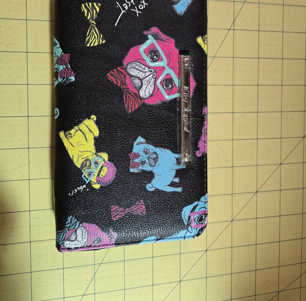 Cute dog covered wallet by Betsey Johnson